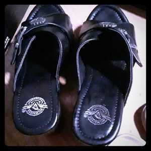 High heeled leather slip on shoes